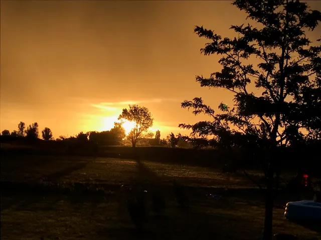 a aerial view of a house with a yard