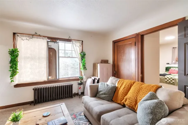 a bed room with a bed and a window