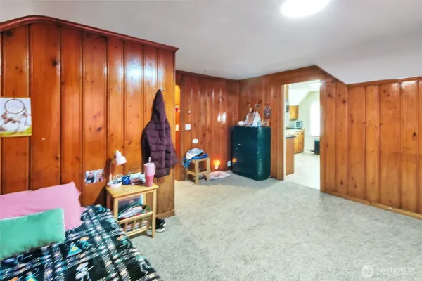 a kitchen with stainless steel appliances a refrigerator and a stove