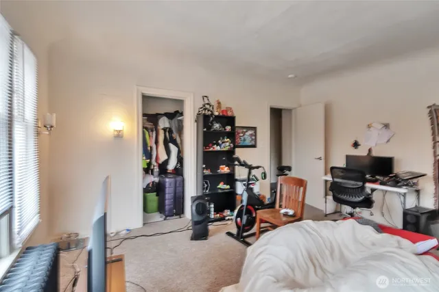 a view of a room with a large window