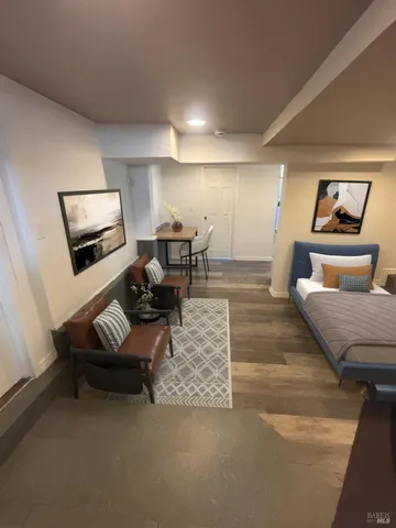 a living room with furniture and a couch