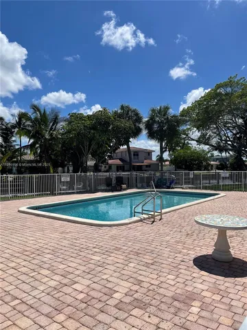 a view of a lake with a yard