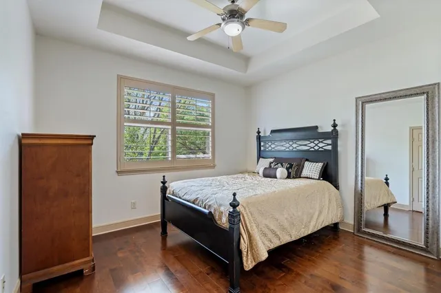a en suite bathroom with a double sink and mirror