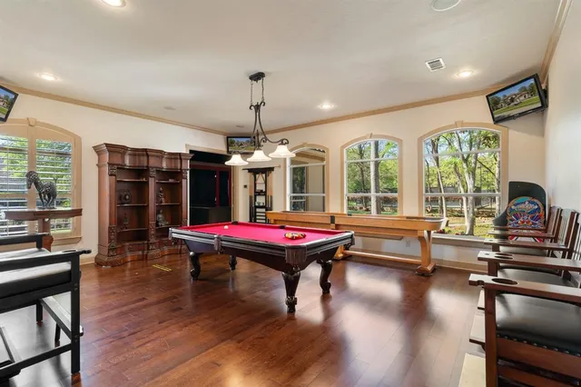 a view of a kitchen with furniture and a window