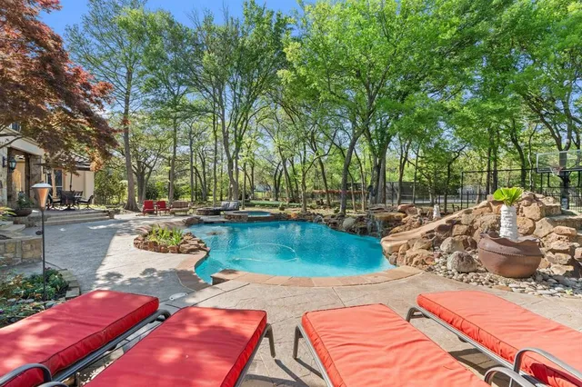 a view of a backyard with wooden floor