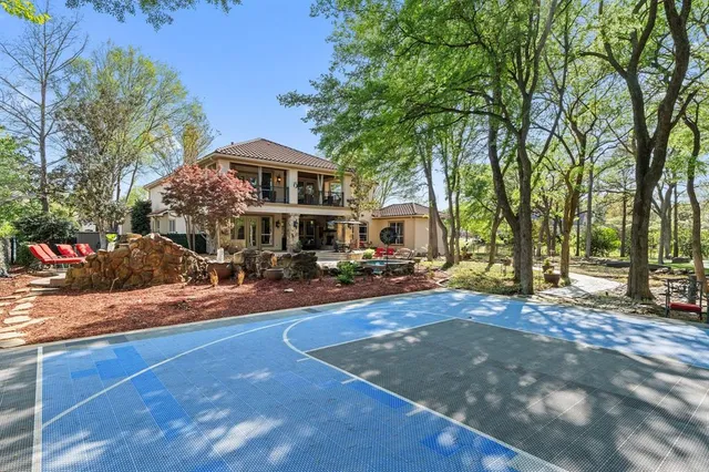 a view of a patio with swimming pool