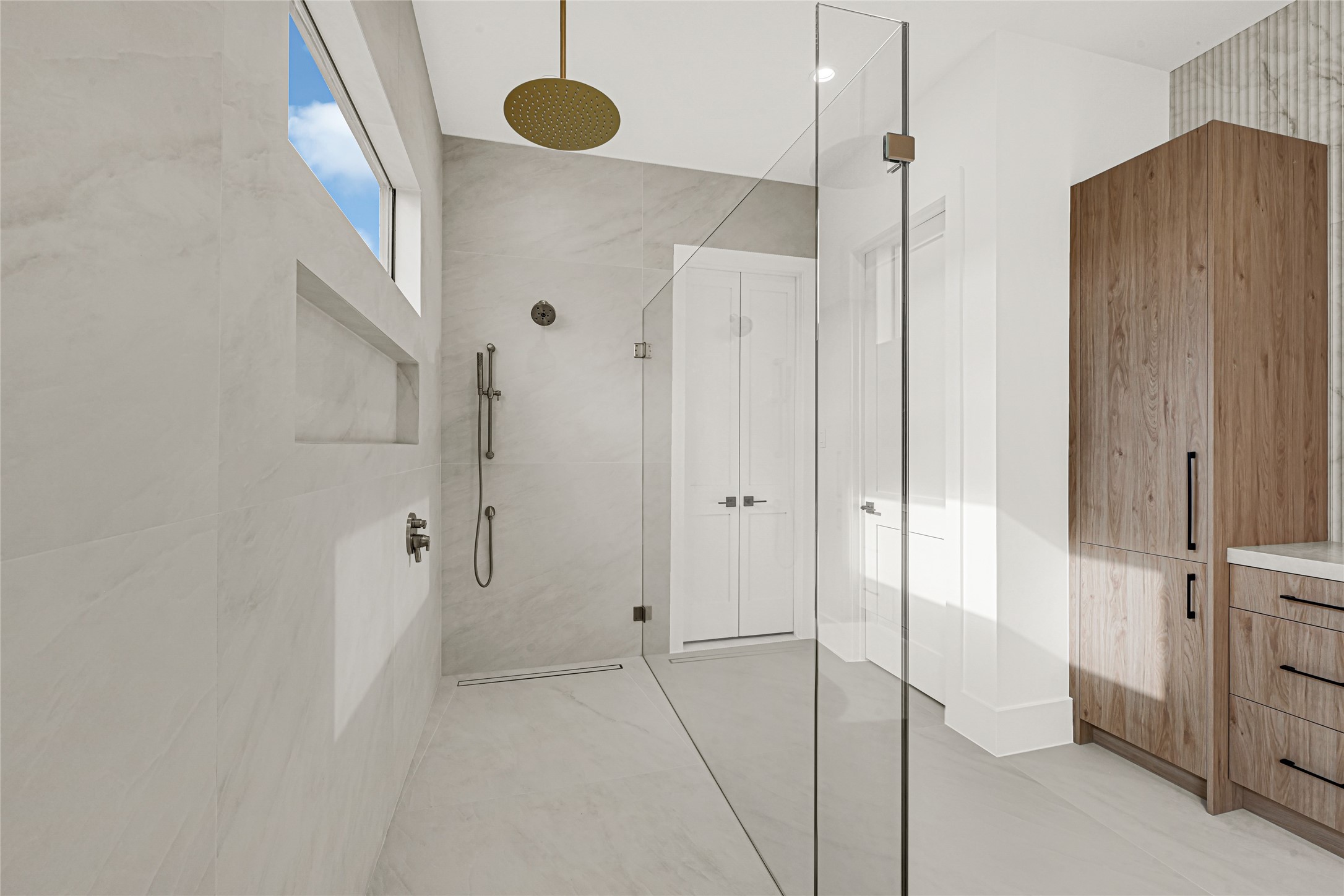 6405 Rodrigo Street, Unit A Houston, TX 77007 - Photo 24 of 28 a bathroom with a shower and a glass door