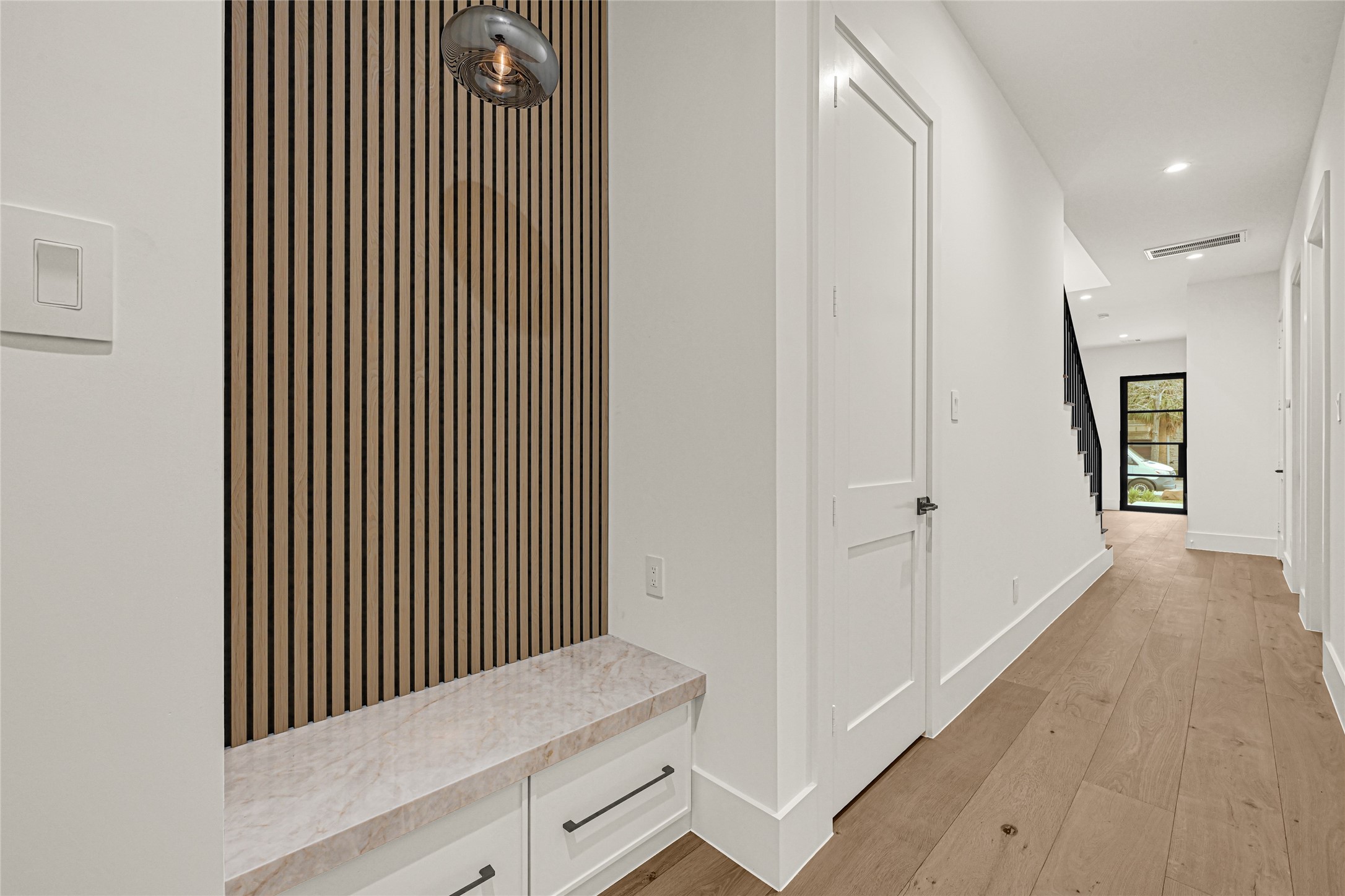 6405 Rodrigo Street, Unit A Houston, TX 77007 - Photo 8 of 28 a view of a hallway with wooden floor