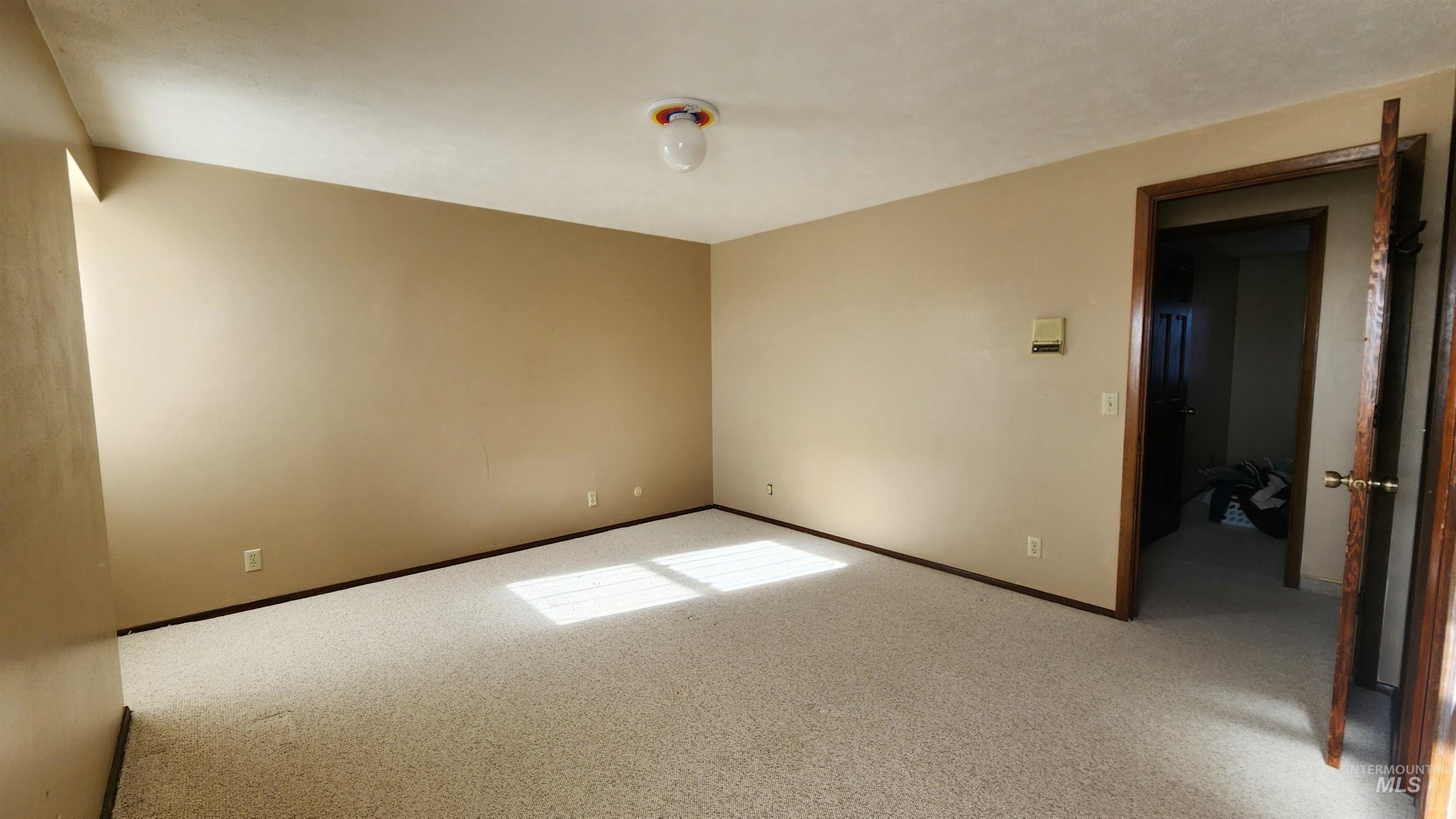 288 South 123 West Burley, ID 83318 - Photo 23 of 36 Bedroom #3 with large closet with built in storage shelves.