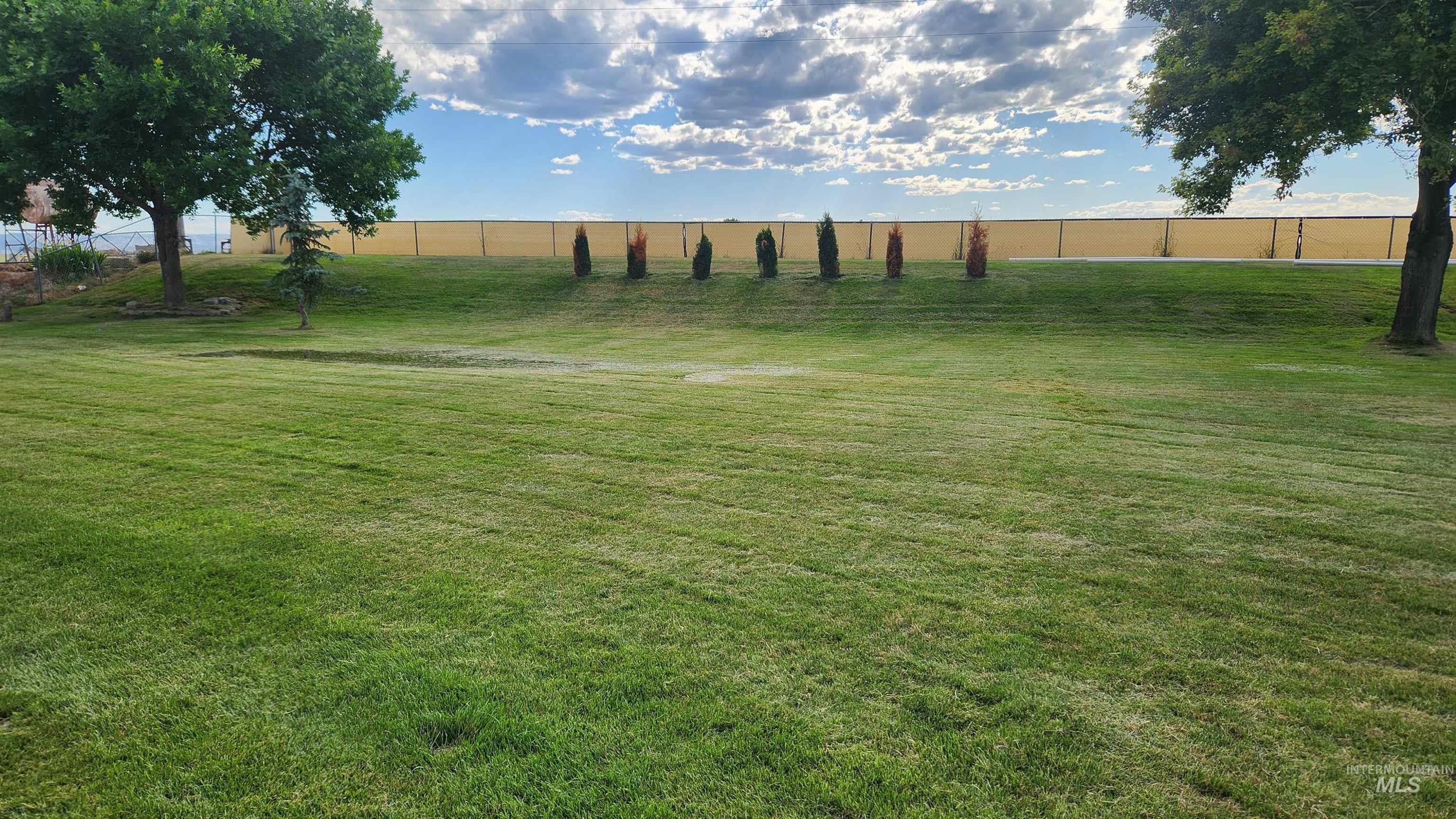 288 South 123 West Burley, ID 83318 - Photo 4 of 36 View of yard with a rural view