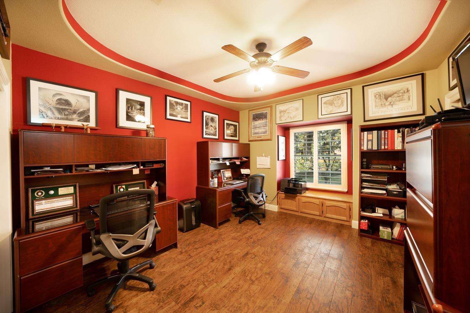 1290 North Applegate Avenue Fresno, CA 93737 - Photo 19 of 65 a view of a workspace with furniture and a window
