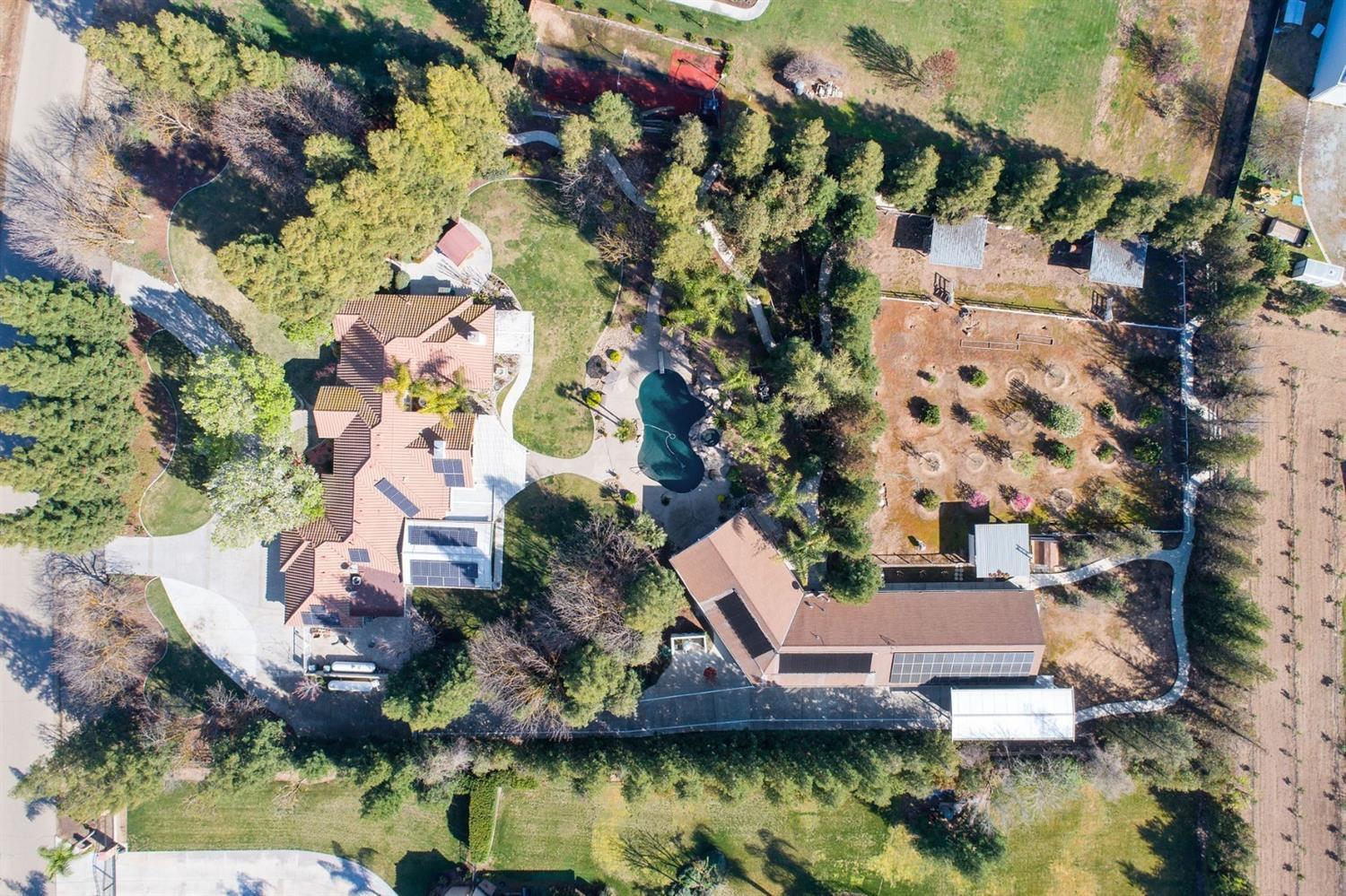 1290 North Applegate Avenue Fresno, CA 93737 - Photo 55 of 65 an aerial view of house with yard swimming pool and outdoor seating