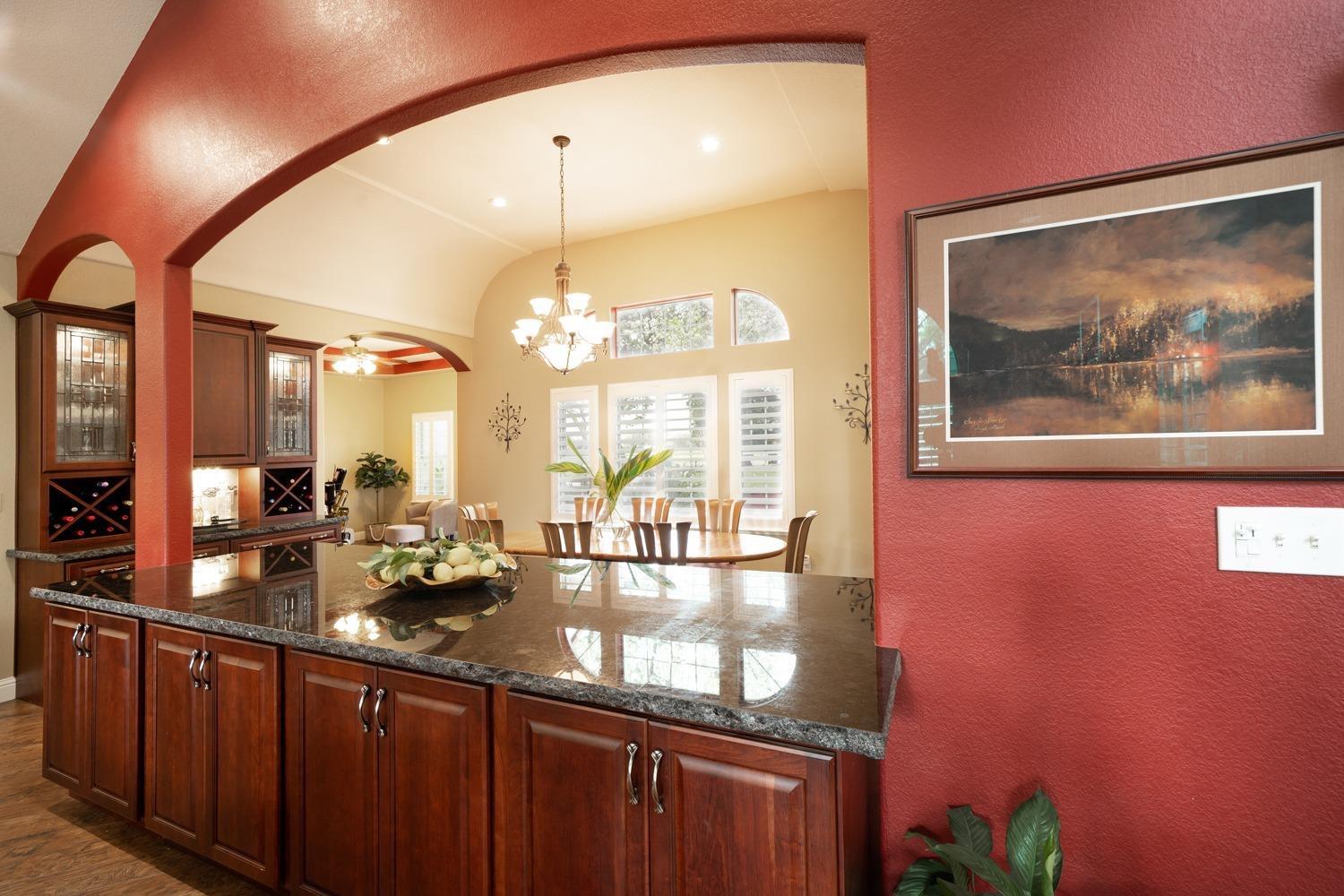 1290 North Applegate Avenue Fresno, CA 93737 - Photo 6 of 65 a kitchen with sink and view of living room