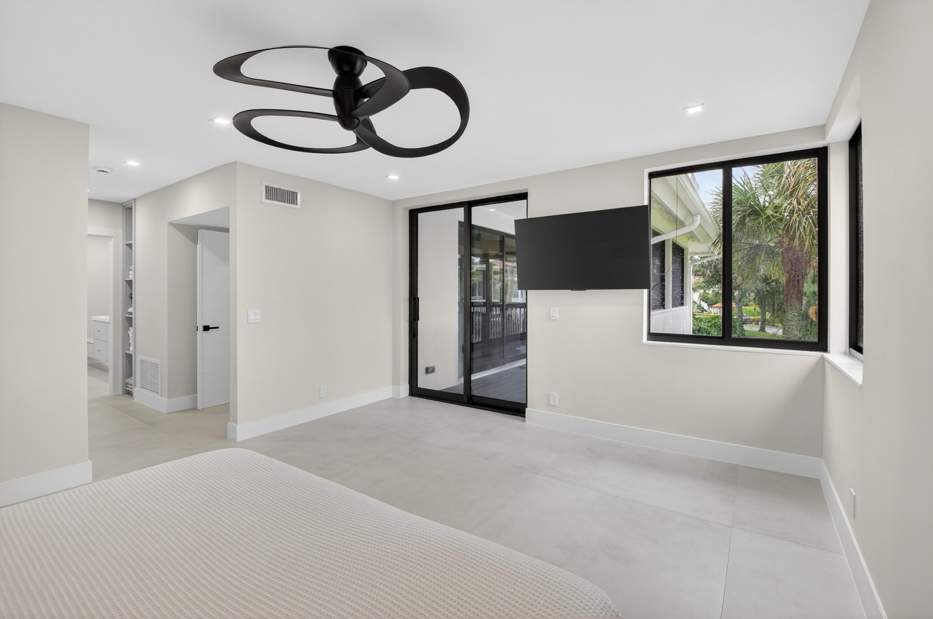 19221 Sabal Lake Drive, Unit 5124 Boca Raton, FL 33434 - Photo 36 of 98 a view of an empty room with a window and kitchen view