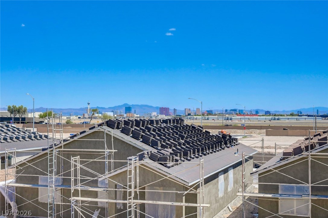 3318 North Decatur Boulevard, Unit 2072 Las Vegas, NV 89130 - Photo 35 of 50 City skyline views from new construction with roofing underway.