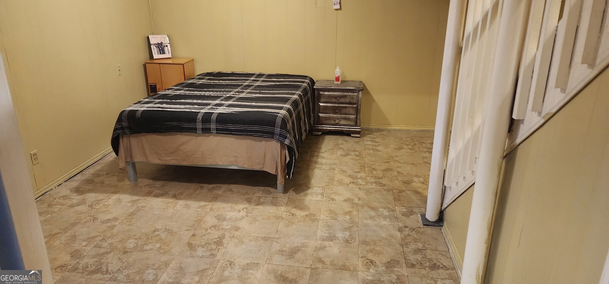 4778 Devon Way Stone Mountain, GA 30088 - Photo 2 of 4 a bathroom with a sink and a mirror