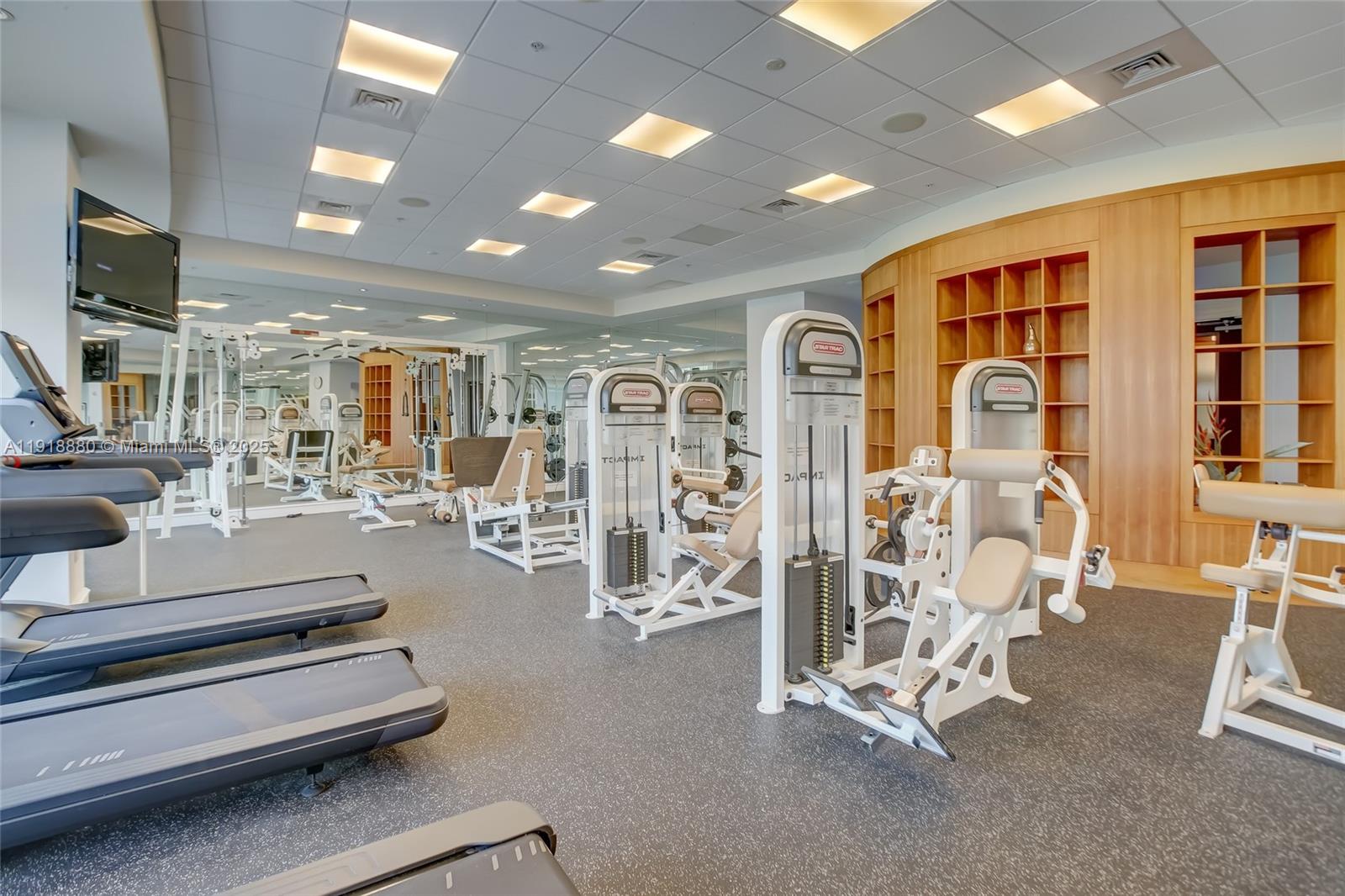 1 North Ocean Boulevard, Unit 1011 Pompano Beach, FL 33062 - Photo 32 of 48 a view of a room with gym equipment