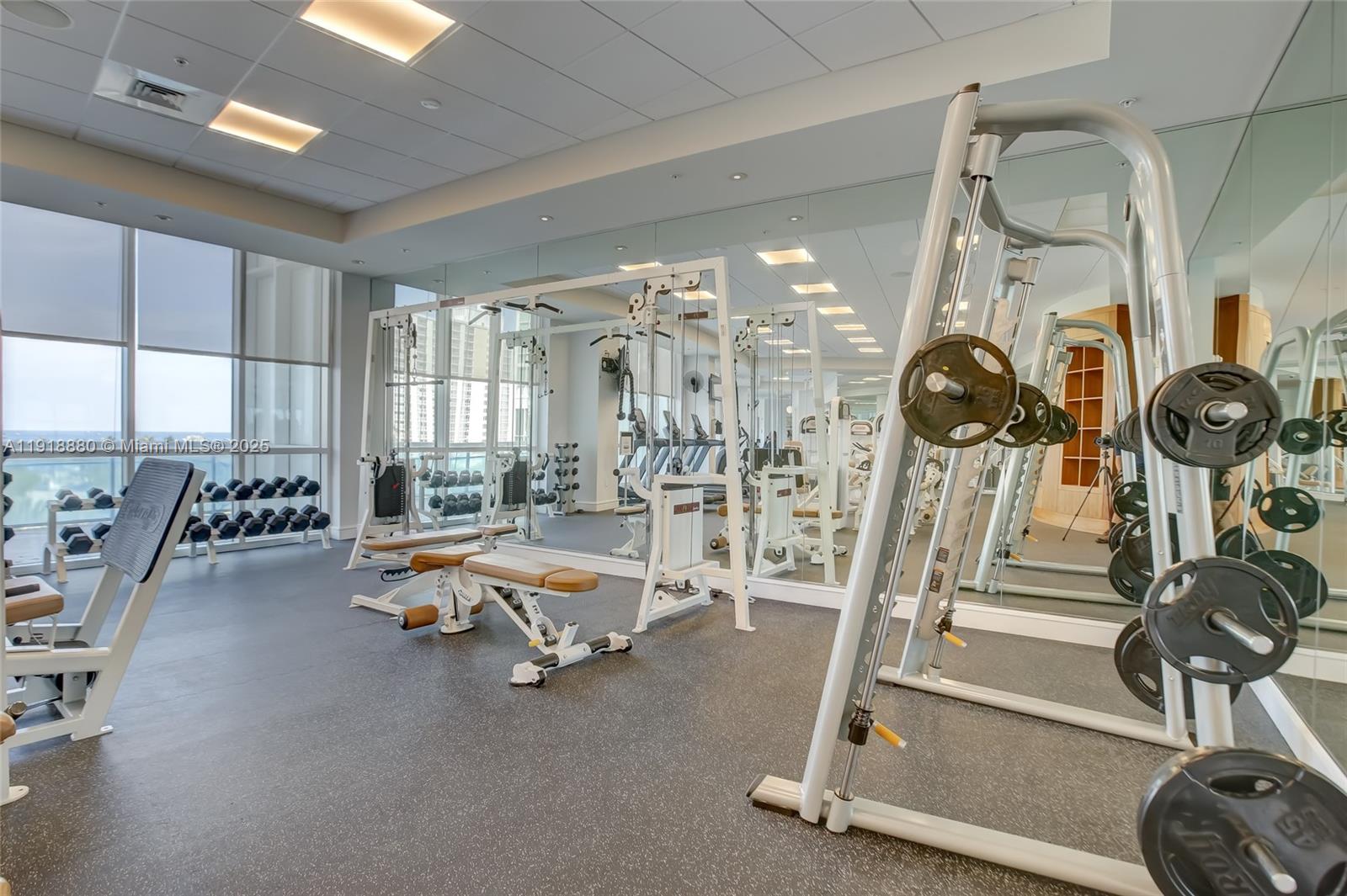 1 North Ocean Boulevard, Unit 1011 Pompano Beach, FL 33062 - Photo 33 of 48 a view of a room with gym equipment