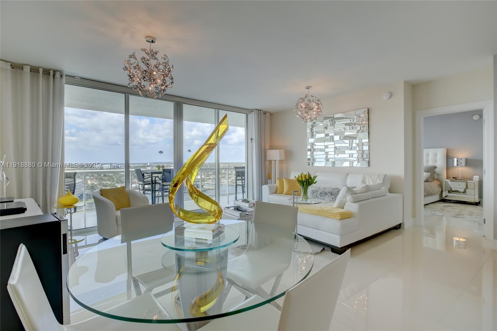 1 North Ocean Boulevard, Unit 1011 Pompano Beach, FL 33062 - Photo 6 of 48 a view of living room with furniture and floor to ceiling windows