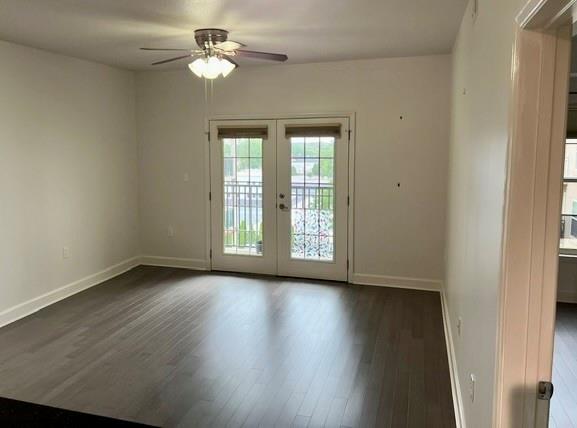 230 East Ponce De Leon Avenue, Unit 409 Decatur, GA 30030 - Photo 3 of 5 a view of room with window ceiling fan and hardwood floor