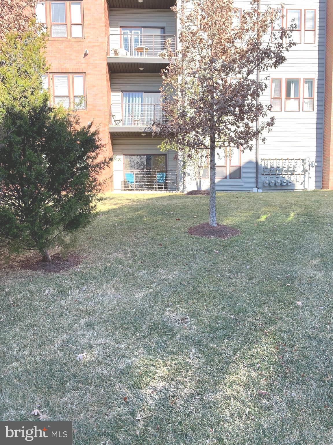 8970 Fascination Court, Unit 111 Lorton, VA 22079 - Photo 34 of 60 Private Patio Rear Building