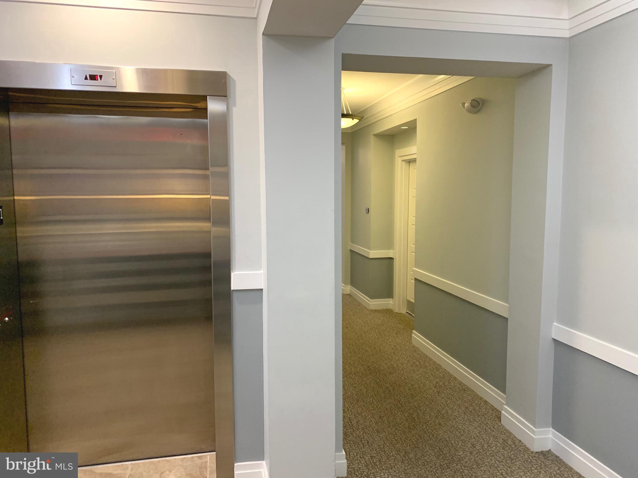 8970 Fascination Court, Unit 111 Lorton, VA 22079 - Photo 5 of 60 Hall and Front Door