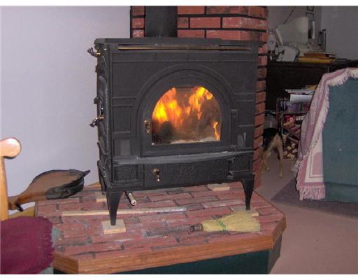 179 Bog Road New Portland, ME 04961 - Photo 4 of 6 Den/Family/Great Room. Wood stove to...