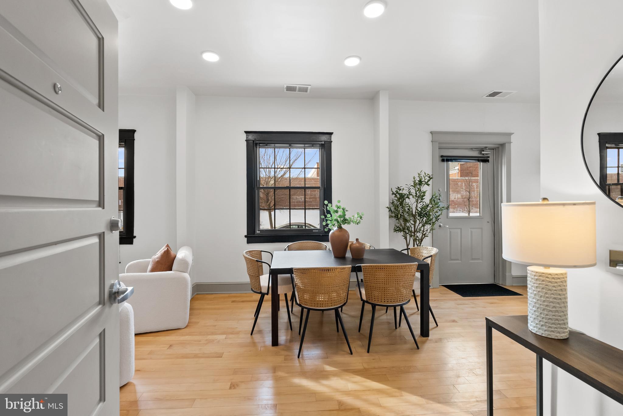 9073 Power House Road, Unit 105 Lorton, VA 22079 - Photo 3 of 39 Abundant natural light and hardwood floors.