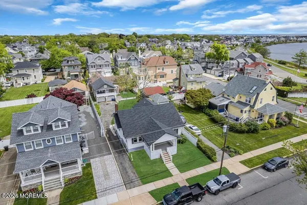an aerial view of a house with a garden