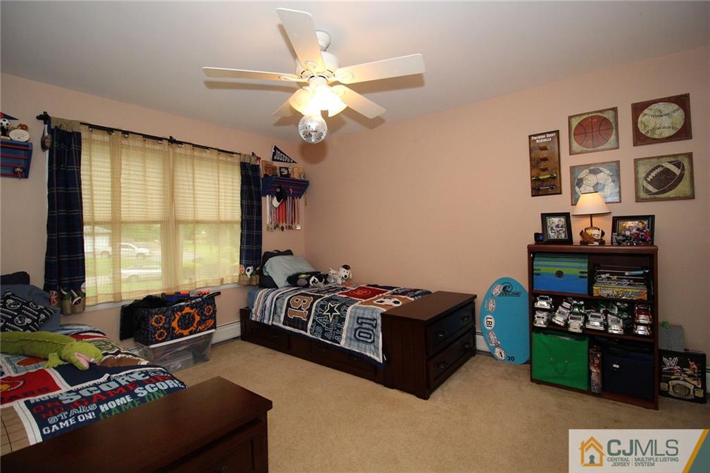 130 Stafford Road Colonia, NJ 07067 - Photo 22 of 25 a bedroom with bed and a window