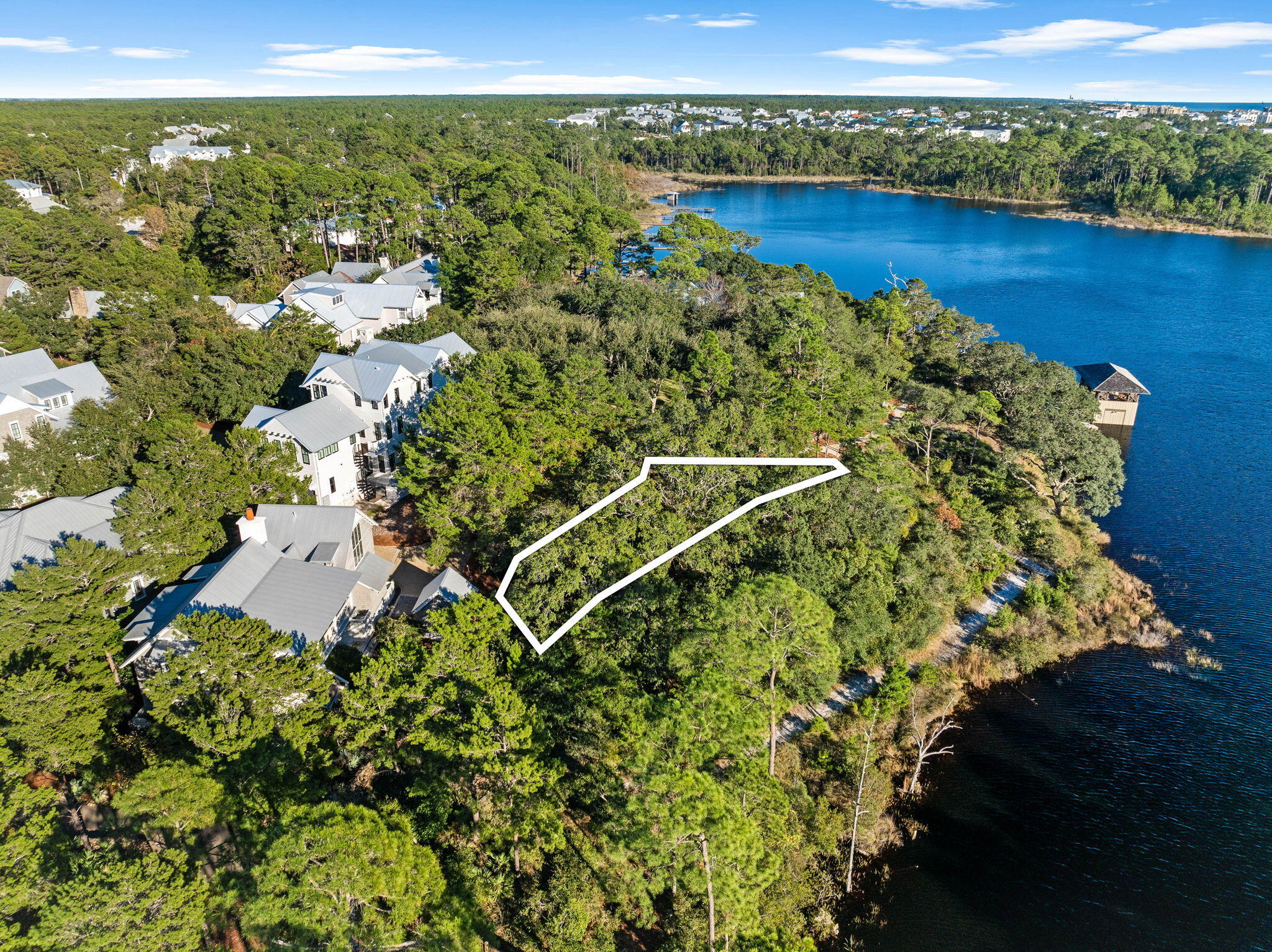 Lot 3 Dewberry Lane Santa Rosa Beach, FL 32459 - Photo 2 of 12 a view of a lake with a mountain