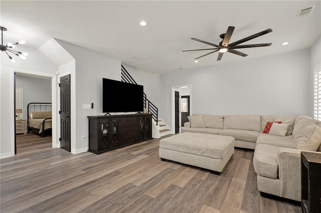 92 Autumn Path Rockmart, GA 30153 - Photo 16 of 44 a living room with a couch and a flat screen tv