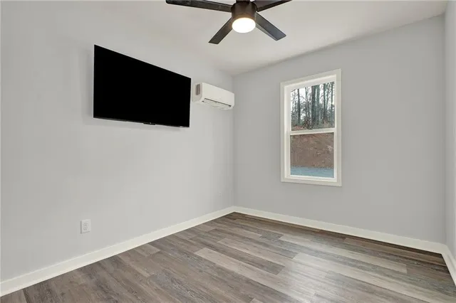 a view of a livingroom with a flat screen tv