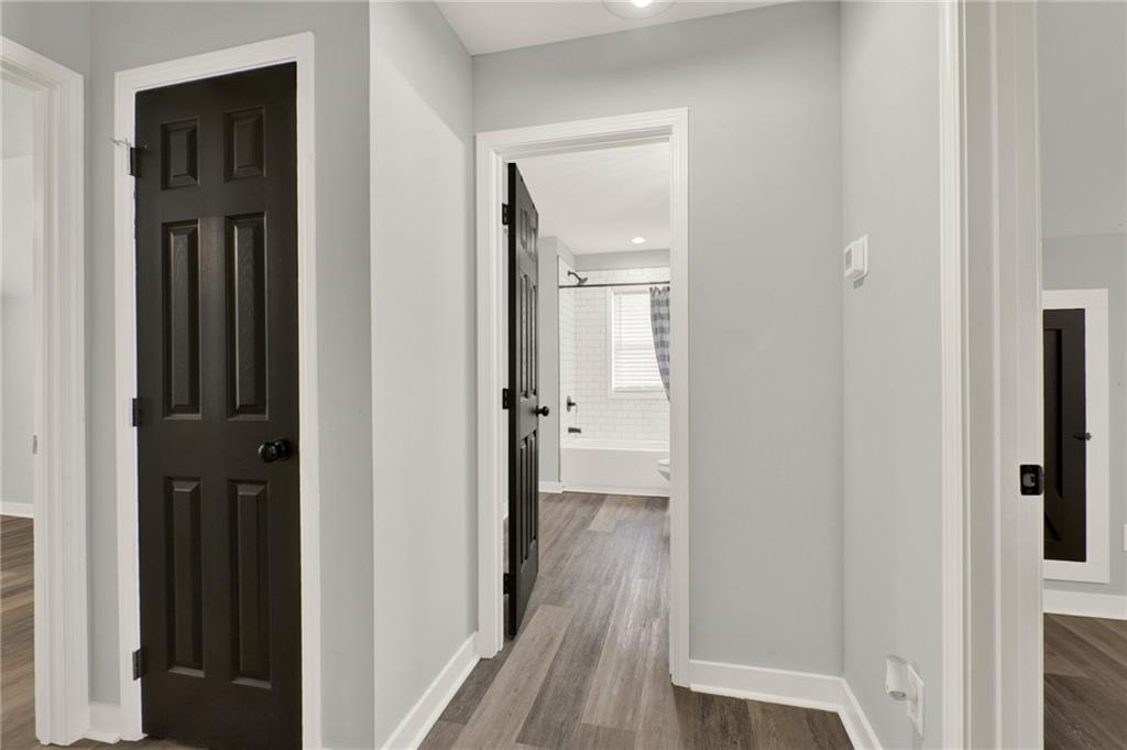 92 Autumn Path Rockmart, GA 30153 - Photo 29 of 44 a view of a hallway with wooden floor