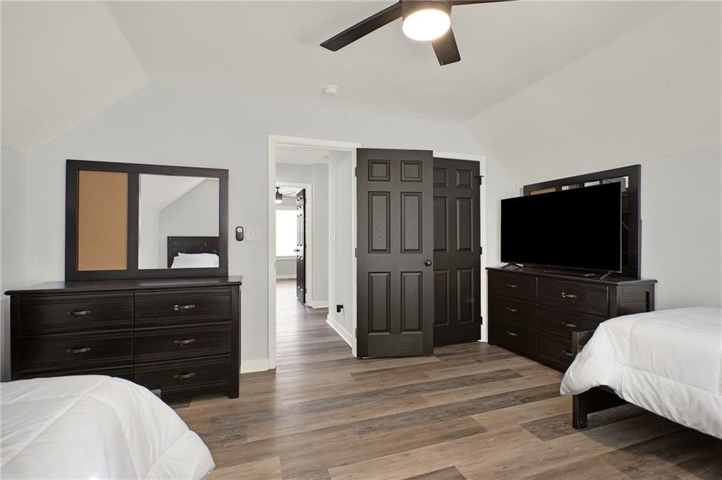 92 Autumn Path Rockmart, GA 30153 - Photo 33 of 44 a living room with a bed and a flat screen tv