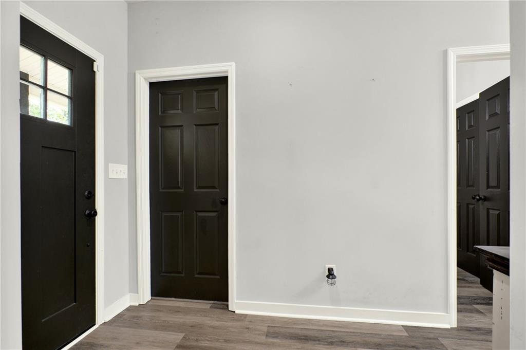 92 Autumn Path Rockmart, GA 30153 - Photo 9 of 44 a view of hallway with wooden floor and closet
