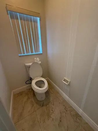 a bathroom with a toilet