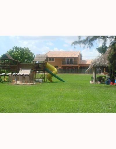 12425 Southwest 43rd Street Miami, FL 33175 - Photo 11 of 11 a black and white photo of a park
