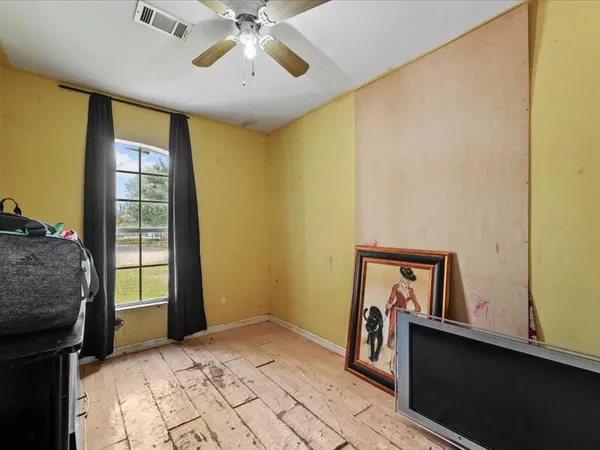 a bathroom with a shower toilet and white sink