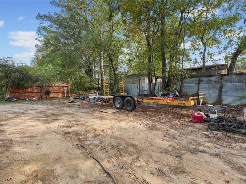 1418 South 7th Street Conroe, TX 77301 - Photo 28 of 36 a view of a park with large trees