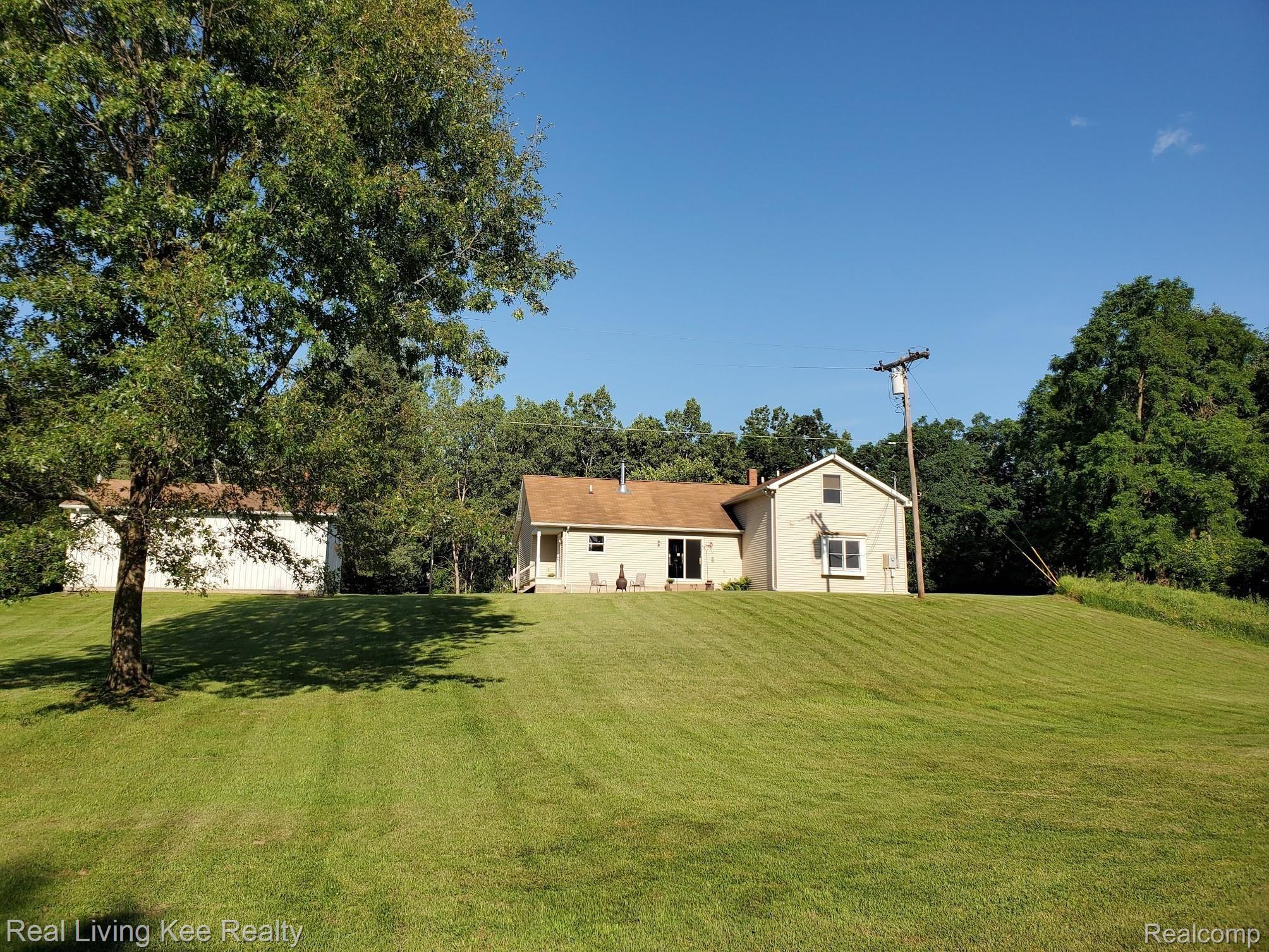 4230 Blood Road Metamora, MI 48455 - Photo 37 of 49 Rear of home and garage/pole barn