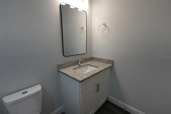 a bathroom with a bathtub and a toilet