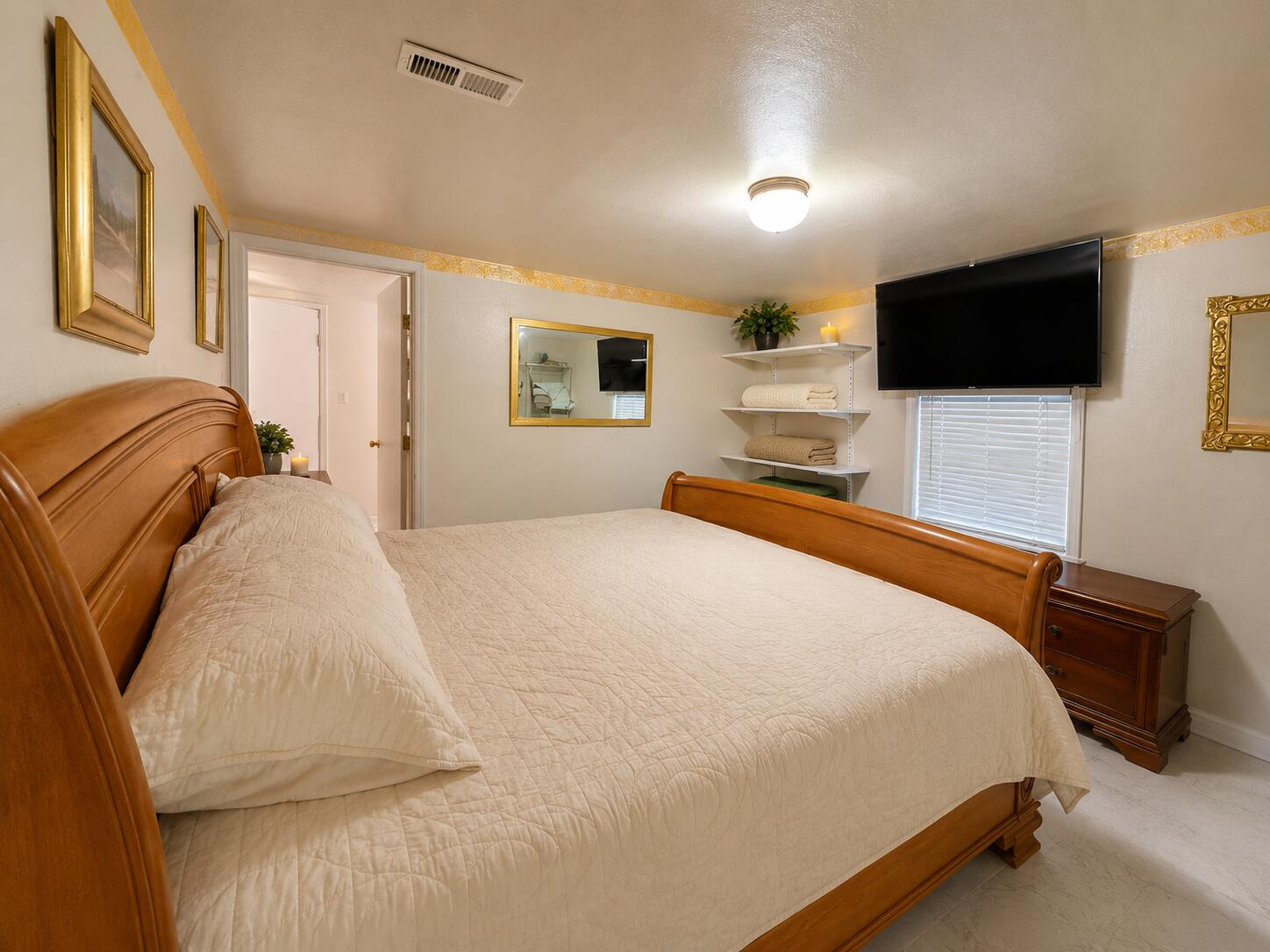 214 South 65th Street Milwaukee, WI 53214 - Photo 15 of 29 Primary bedroom has attached bonus room ideal for a home office, sitting area, huge walk-in closet/dressing rm or potential 5th bedroom! Some photos may include virtually staging and or digital enhancements.