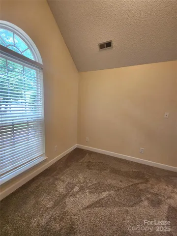 a bathroom with a shower a bathtub and a shower