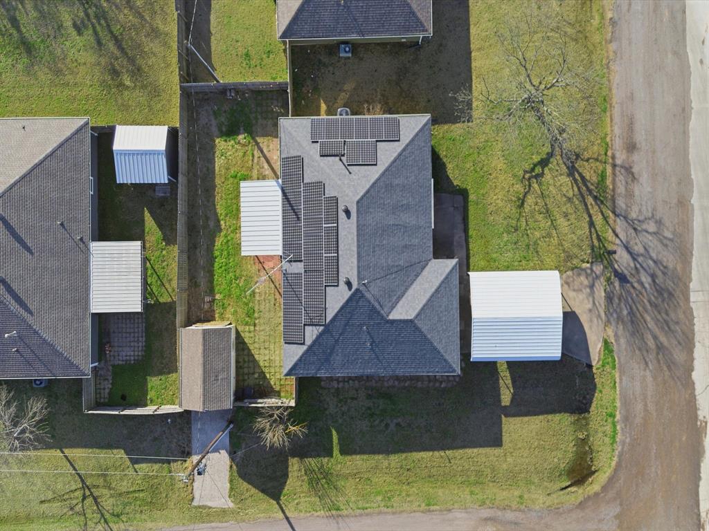 701 College Street Celeste, TX 75423 - Photo 28 of 29 an aerial view of a house with a yard