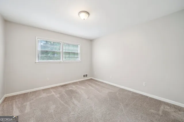 an empty room with a window