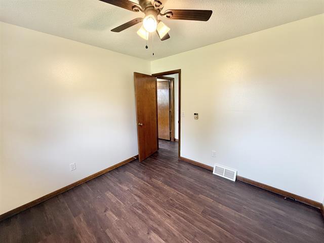 8567 Valley View Drive Stillman Valley, IL 61084 - Photo 23 of 29 a view of an empty room with wooden floor
