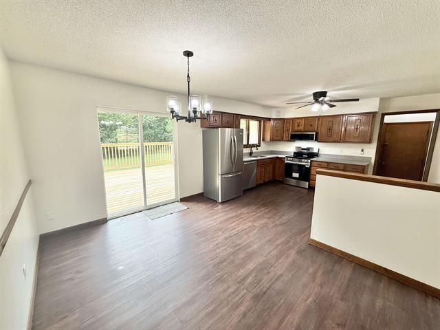 8567 Valley View Drive Stillman Valley, IL 61084 - Photo 9 of 29 a view of a kitchen and a microwave