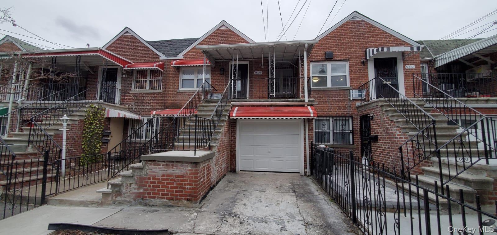 a front view of a house with a porch