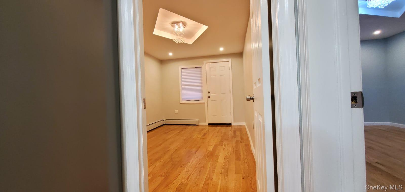 914 Duncan Street Bronx, NY 10469 - Photo 3 of 10 a view of an empty room